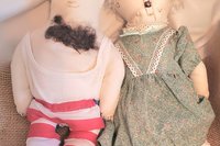 Charming Heritage: Cheeky Grandpa and Lovely Grandma Folk Art Dolls