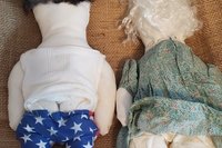 Charming Heritage: Cheeky Grandpa and Lovely Grandma Folk Art Dolls